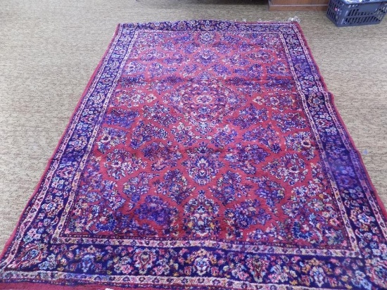 8'x5'7" oriental throw rug, some damage to edges.