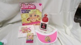 Assortment of Barbie items, sticker album,