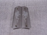 Aluminum 1911 grips.