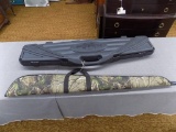 2 long gun cases, one soft, one hard