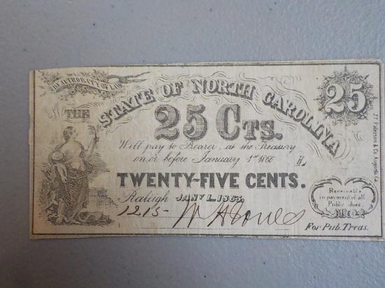 M64  25 cents North Carolina 1863 good to 1866