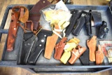 LARGE GROUPING OF LEATHER HOLSTERS 16 PCS