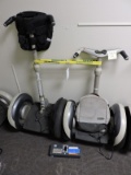 Pair of Segway 1 Scooters.  Not running, need work.