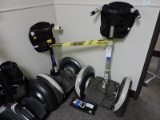 Pair of Segway Scooters - One Segway 1 / One Segway i2 (short model).  Not running, Need work.