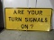 'ARE YOUR TURN SIGNALS ON?' Metal Road Sign