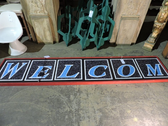 Large Illuminated Sign - with WELCOM misspelled.