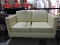 MODERN TAN FAUX LEATHER LOVE SEAT - Good Condition