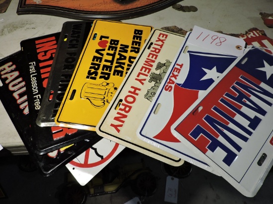 Stack of NOVELTY LICENSE PLATES