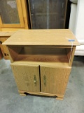 Blonde Wood Cabinet with Swivel Top / Laminate