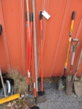 An Assortment of Garden Hoes and Rakes