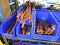 9 Bins of strap style pipe hangers and regular pipe hangers