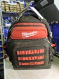 Milwaukee backpack {has a broken strap} filled with hand tools - see photo
