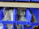 Row of bins w/ screws, wire ties and tape - see pictures