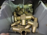 Single bin of brass hose barb connector tees