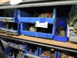Entire shelf of various pipe hangers and accessories