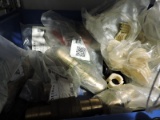 Bin of large brass hose barb connectors and assorted other items