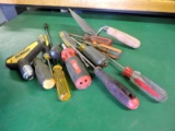 Assorted {12} screw drivers, nut drivers and a trowel