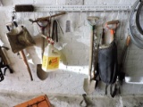 Wall Rack of Garden Tools: Spades, Pitch Fork, etc….