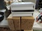 Pair of white rolled paper towel dispensers commercial grade