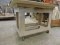 Rolling Wooden Work Table / 24