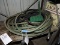 Lot of 3 Garden Hoses and a Wall-Mount Hose Keeper