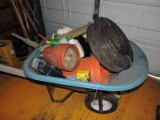 Wheel Barrow Filled with Gardening Supplies - see photo