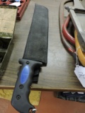 Machete - Appears to be new with the plastic cover on the blade / 18