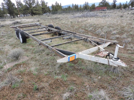 Tandem-Axle Flatbed Trailer Frame / 4 Tires have Tall Tread