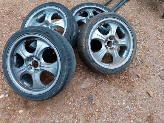 NOT SOLD 18 IN UNIVERSAL TIRES & RIMS