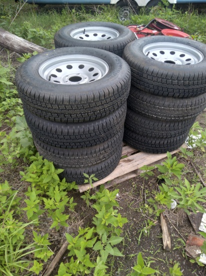 *NOT SOLD* 4 205/75 R15 TIRES ON 5 HOLE WHEELS  (BRAND NEW)