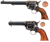 Two Miniature Reproduction Uberti Single Action Army Revolvers