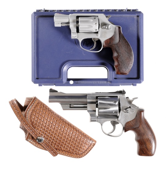 Two Smith & Wesson Double Action Handguns