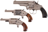 Three Revolvers and Two Collector Bullet Boards