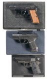 Three Cased Semi-Automatic Pistols