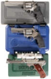 Three Cased Handguns