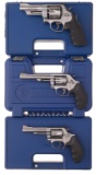 Three Smith & Wesson Double Action Revolvers with Cases