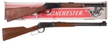 Two Winchester Lever Action Carbines and Bronze Statue