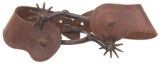 Two Pairs of Spurs with Leather Straps