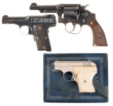 Three Smith & Wesson Hand Guns