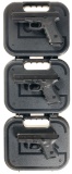 Three Glock Semi-Automatic Pistols with Cases