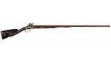 Elaborate Engraved, Carved, and Gold Accented Flintlock Shotgun