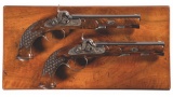 Cased Pair of Engraved Anton Burckhardt Percussion Pistols