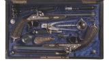 Cased Pair of Engraved and Carved Percussion Dueling Pistols