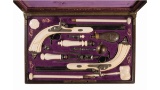 Cased Pair of Engraved Lefaucheux Percussion Pistols