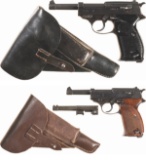 Two German Military P.38 Semi-Automatic Pistols with Holsters