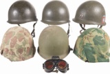Six U.S. M1 Helmets and a Pair of Goggles