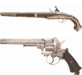 Two Engraved Antique Handguns