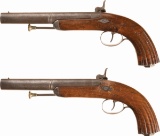 Two Engraved Back Action Percussion Pistols with Ornate Holster