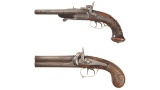 Two Engraved and Carved European Double Barrel Pistols