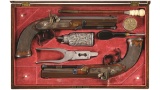 Cased Pair of Engraved and Gold Accented Tryon Percussion Pistol